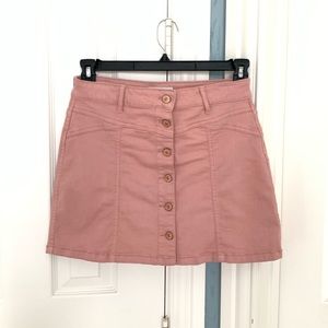 pink button skirt